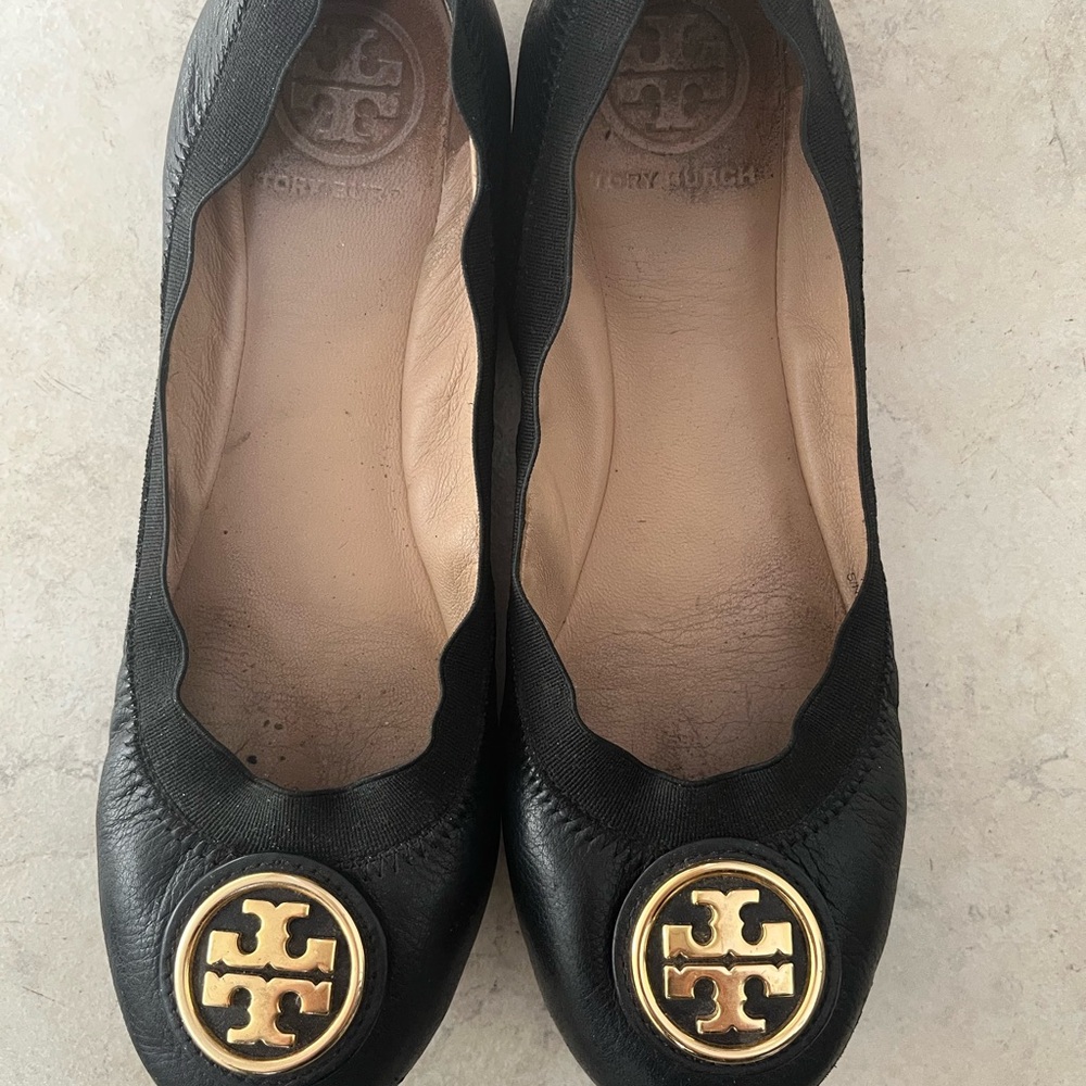 Tory Burch Black and Gold Leather Flats with Medallion